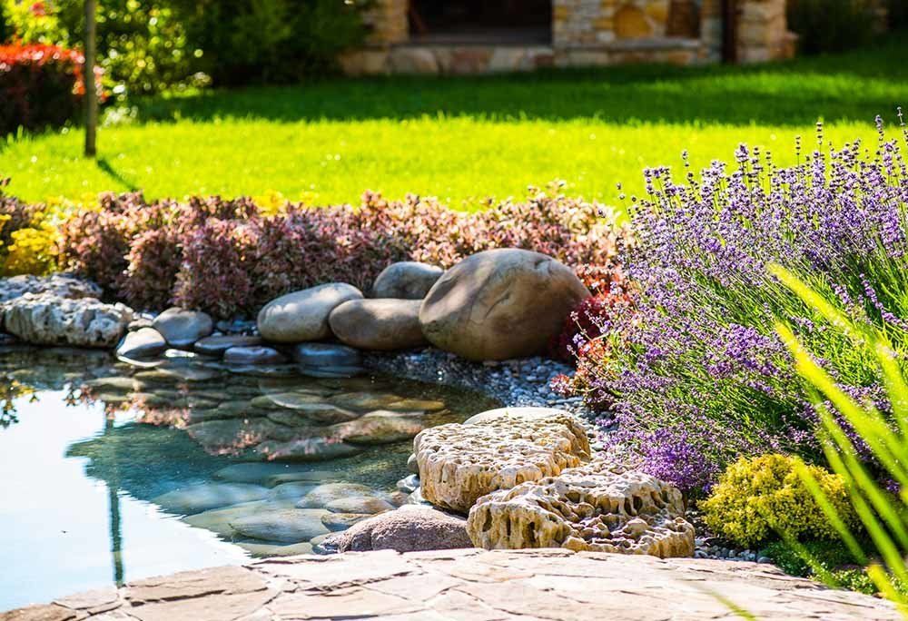 Beautiful Waterscape — Dayton, TX — Precision Lawns