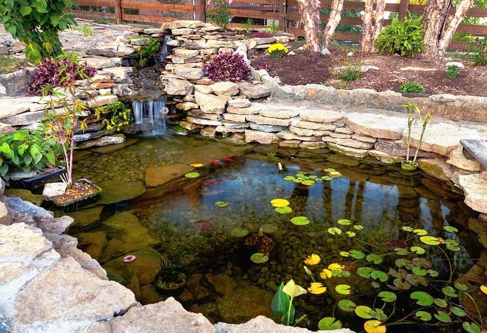 Backyard Waterfall — Dayton, TX — Precision Lawns
