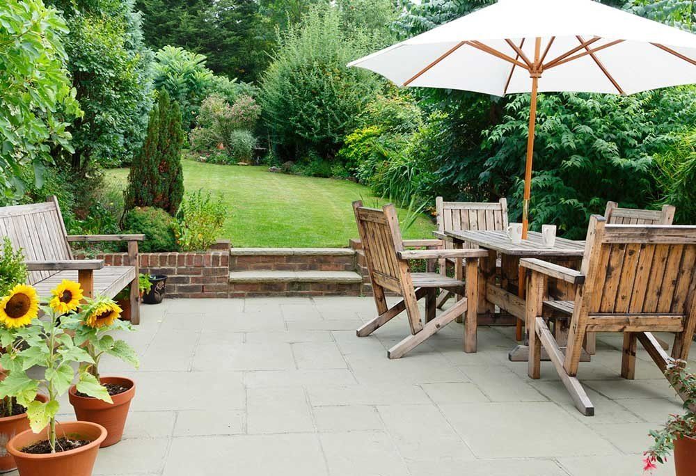 Backyard Dinning Area — Dayton, TX — Precision Lawns