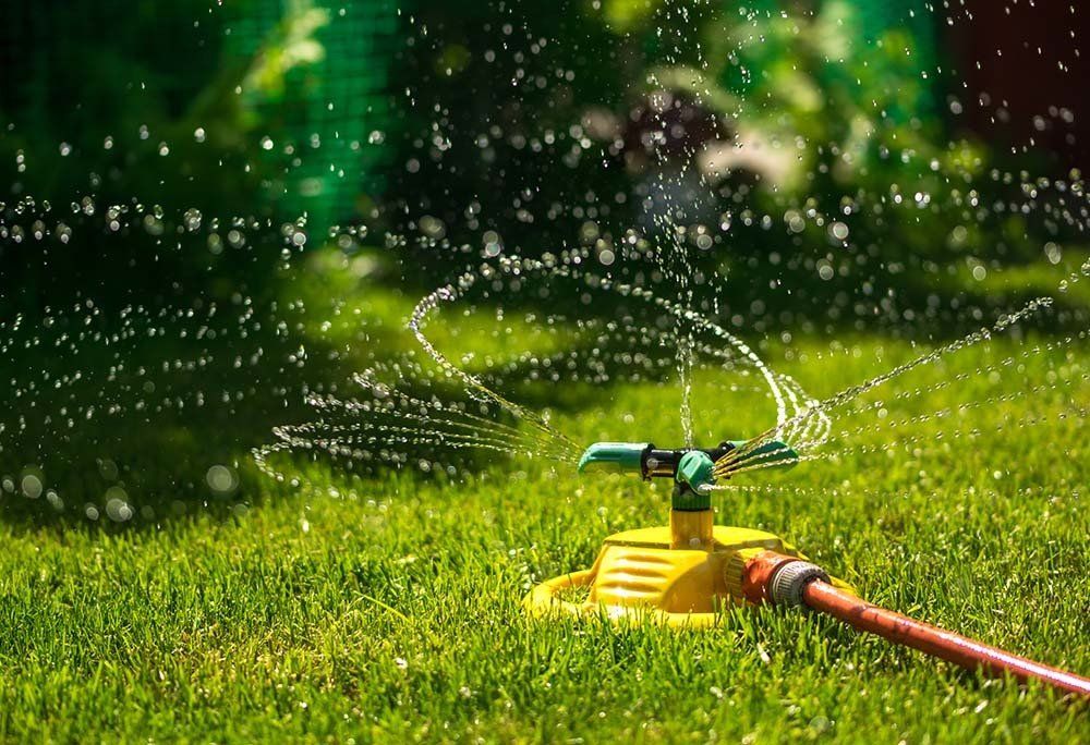 Garden Hose and Sprayer — Dayton, TX — Precision Lawns