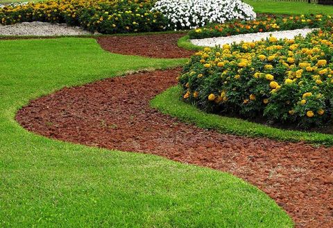 Stone Pathways in Grass with Flower Beds — Dayton, TX — Precision Lawns
