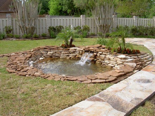 Backyard Waterfalls Landscape — Dayton, TX — Precision Lawns