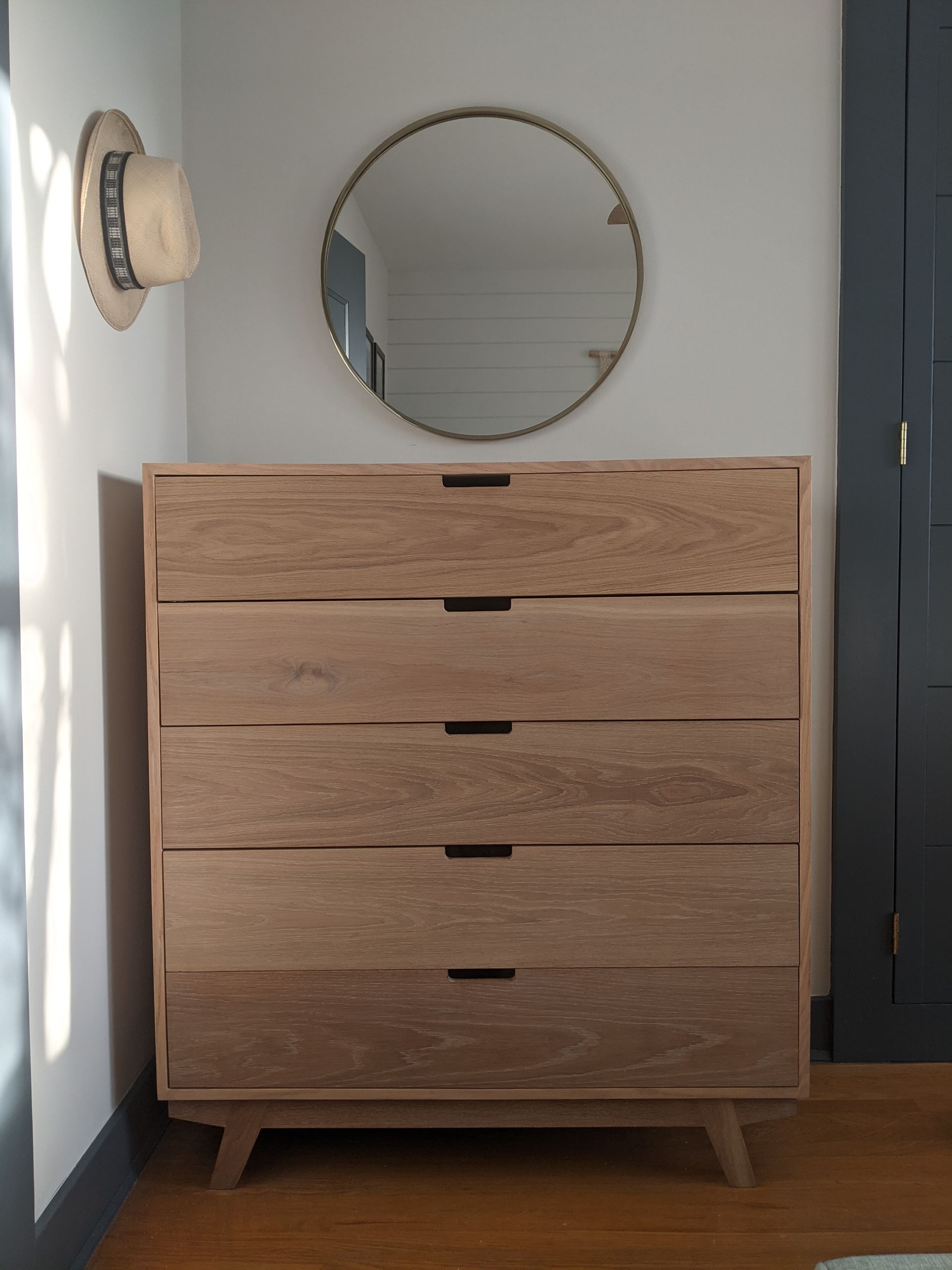 custom wooden dresser in bedroom