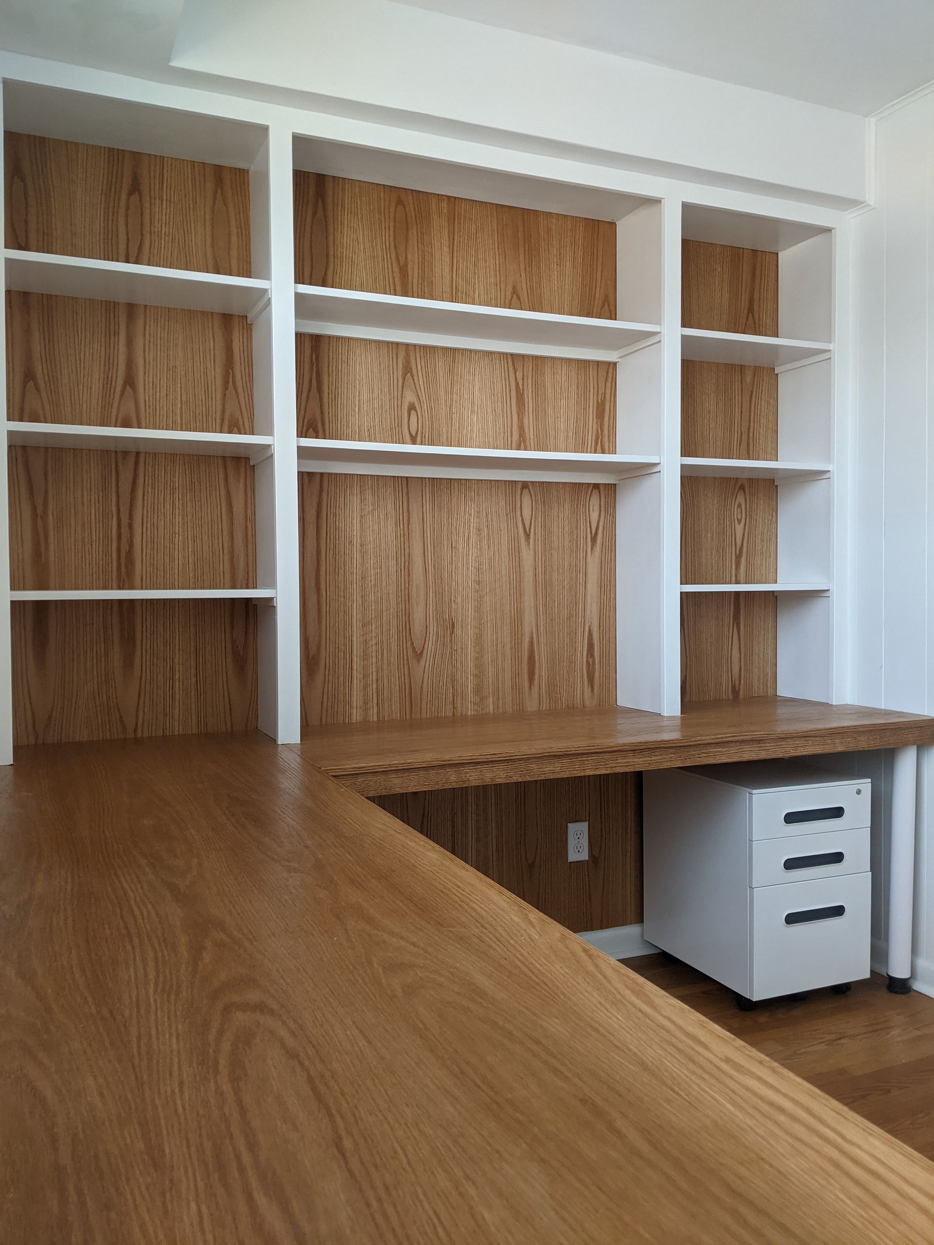 custom built in wooden desk with shelving