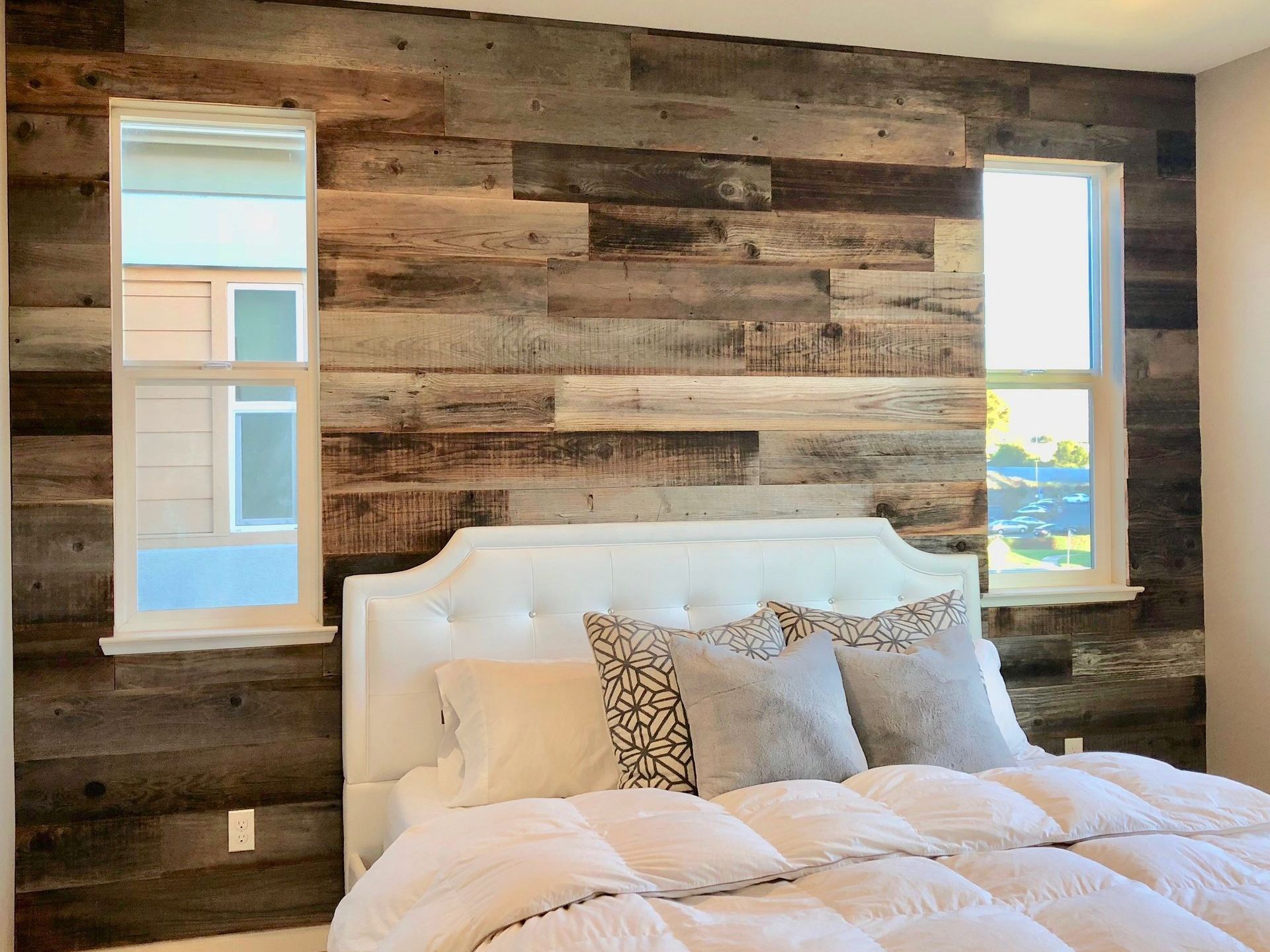 bedroom with wood feature wall