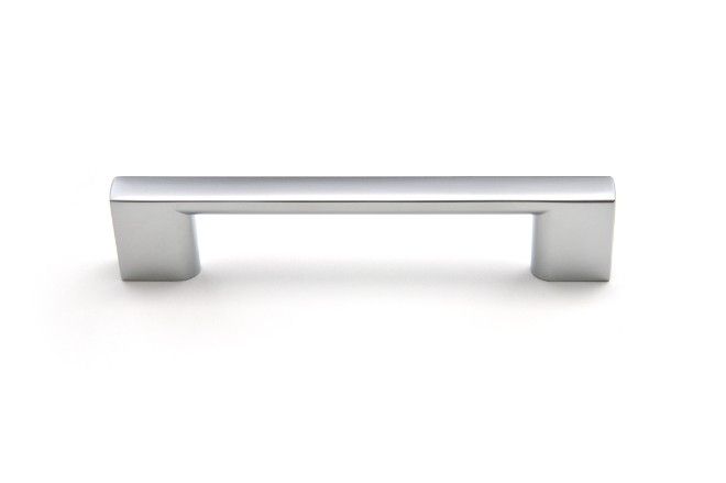 A stainless steel cabinet handle on a white background.