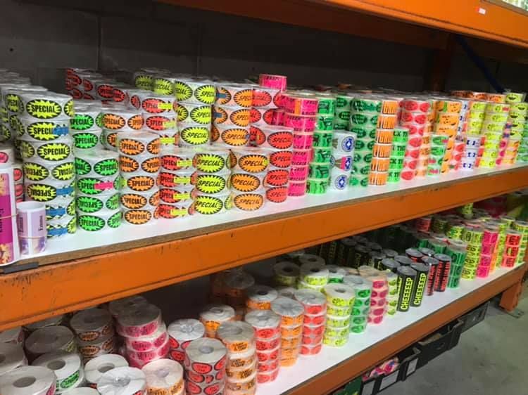 A Shelf Filled With Rolls of Toilet Paper in a Store — Aldine Printers in Innisfail, QLD