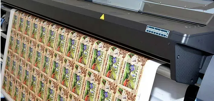 A Large Piece of Paper is Being Printed on a Large Printer — Aldine Printers in Atherton, QLD