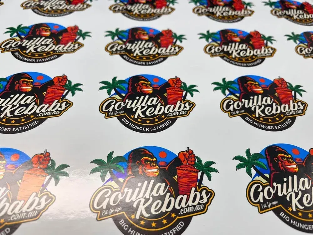 A Bunch of Stickers for Gorilla Kebabs With Monkeys and Palm Trees — Aldine Printers in Bungalow, QLD