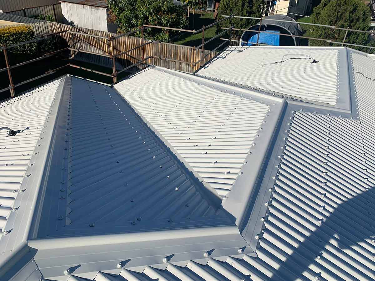 A Close Up of a Roof With a Triangle in the Middle — Ben McLennan Constructions in Grafton, NSW