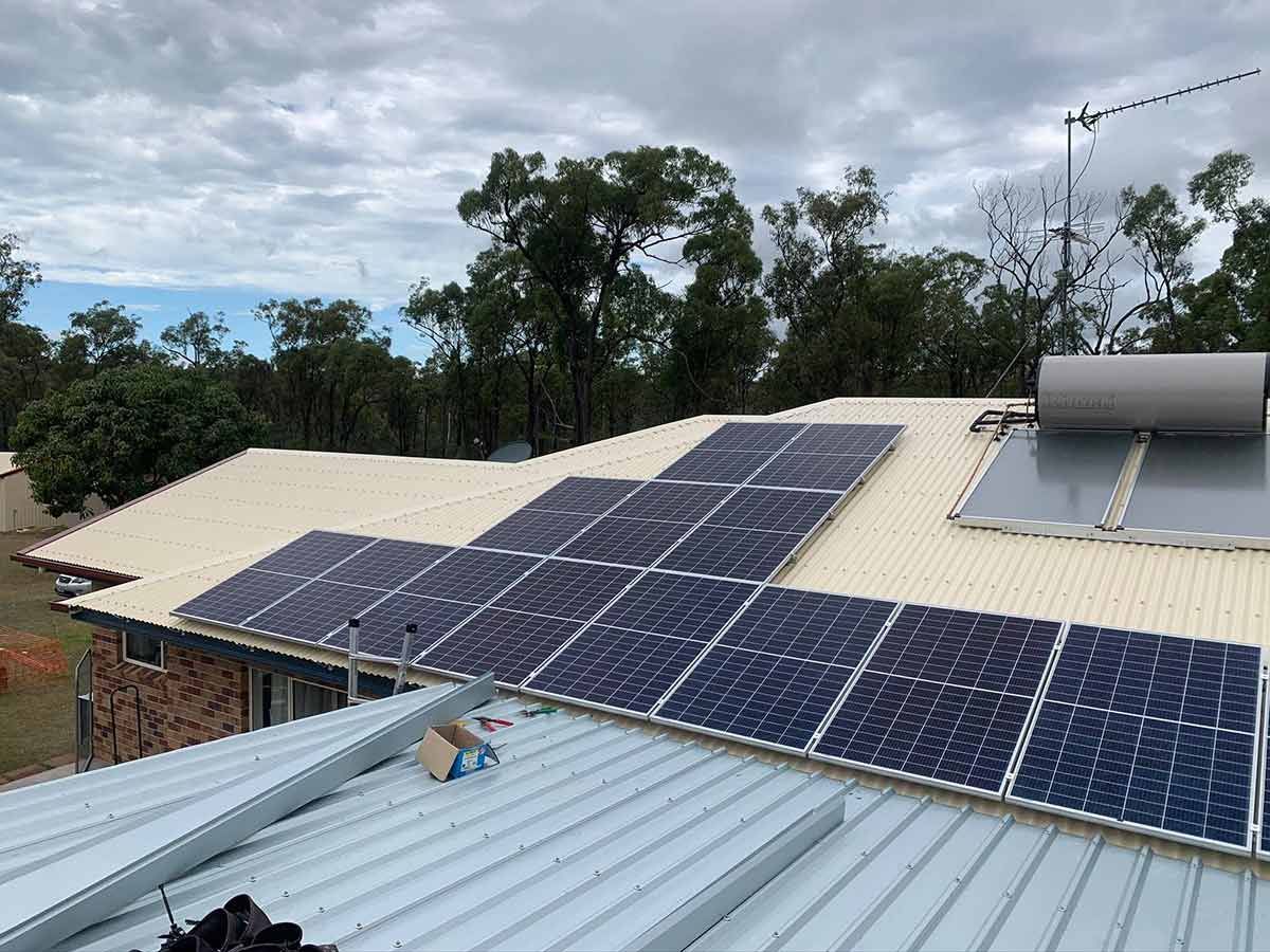 There Are Many Solar Panels on the Roof of a House — Ben McLennan Constructions in Port Macquarie, NSW