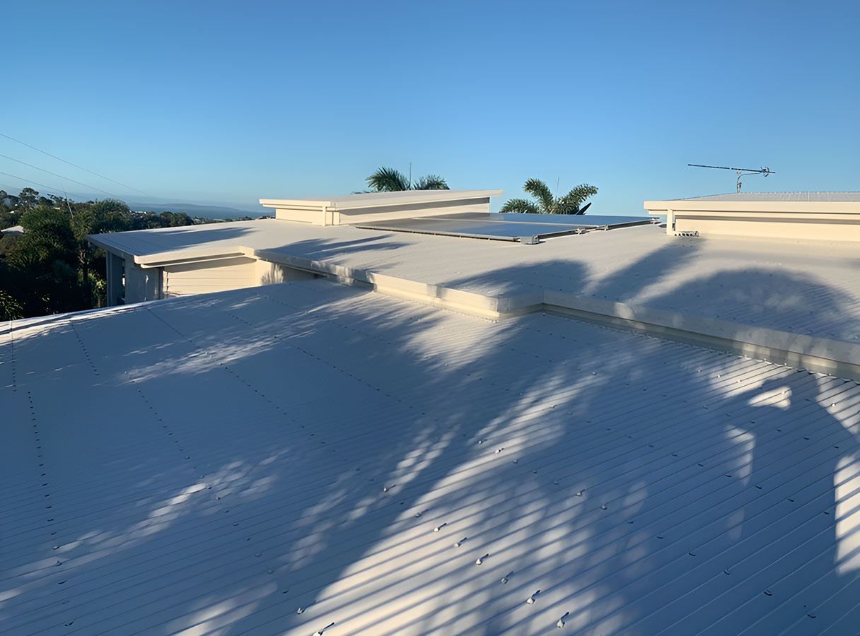 A White Roof With a Blue Sky in the Background — Ben McLennan Constructions in Casino, NSW