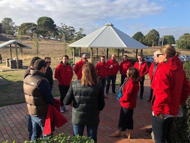 group of people wearing red