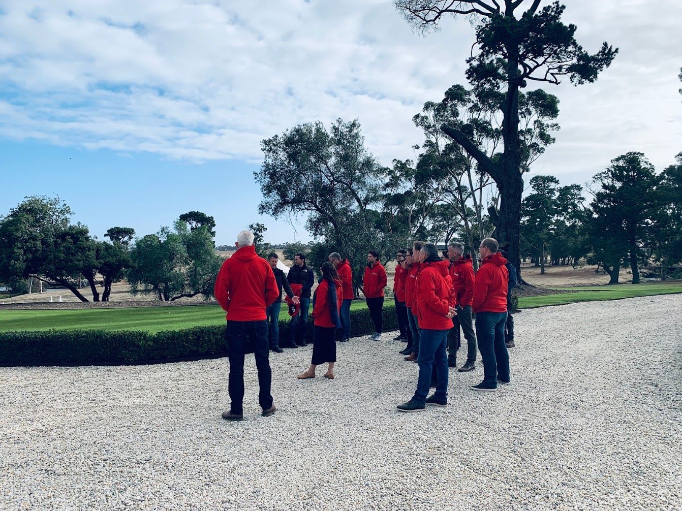 group of people wearing red