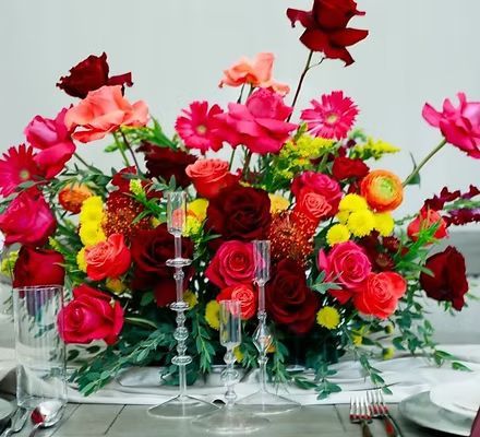A table with a bunch of flowers on it