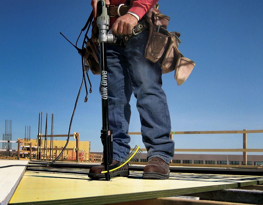 A Man Holding A Spline Strap — All Trades Equipment In Lismore, NSW