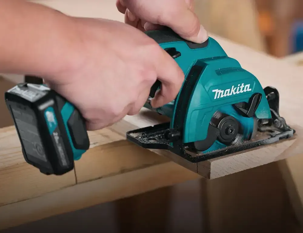 A Person Is Blowing Leaves With A Stanly Blower — All Trades Equipment In Lismore, NSW