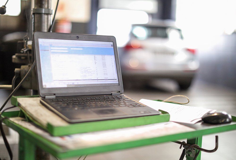 Laptop On Table — Hagerstown, MD — Guaranteed Truck & Auto Repair