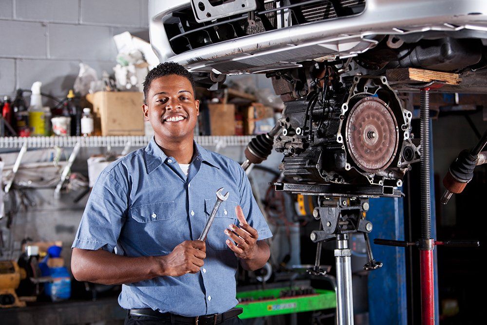Mechanic Fixing The Car Transmission — Hagerstown, MD — Guaranteed Truck & Auto Repair