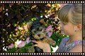 yorkie-being-held-by-child-