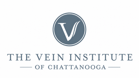 The Vein Institute of Chattanooga logo with a blue circular “V” emblem and serif text on white background