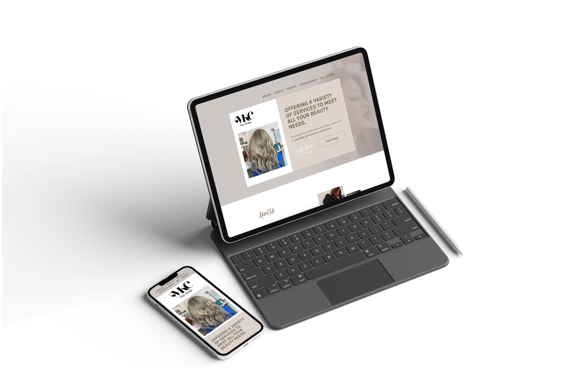 A laptop and a cell phone are sitting next to each other on a table.