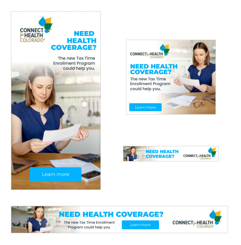 A woman is sitting at a table reading a piece of paper.