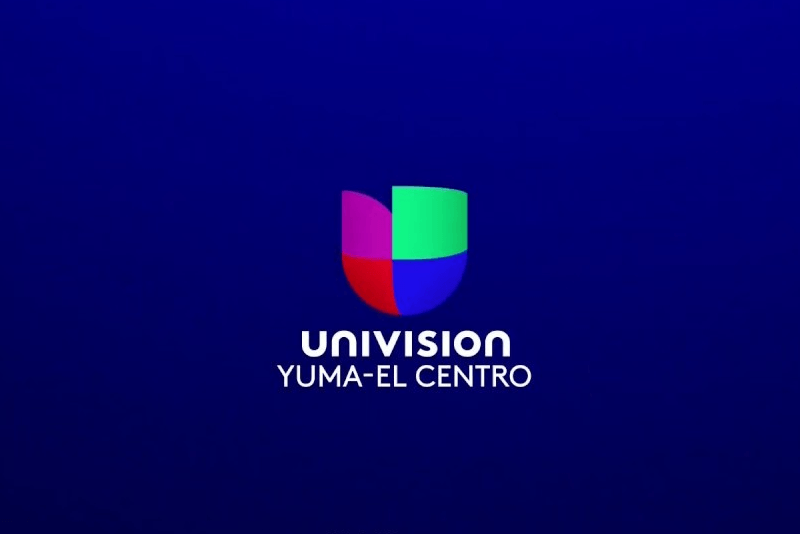A logo for univision yuma-el centro on a blue background