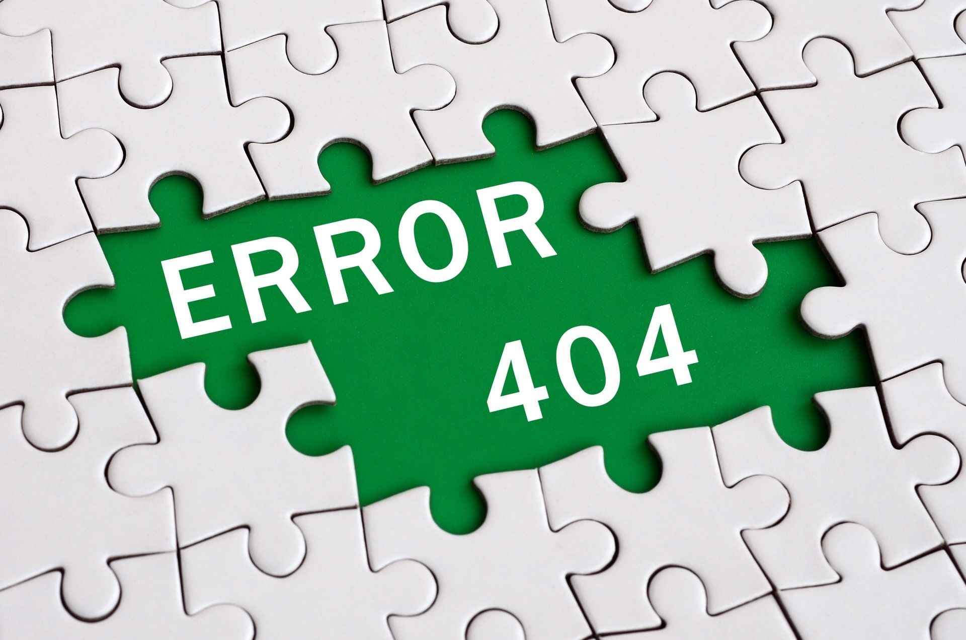 A white puzzle surrounds text that says