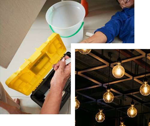 A man is fixing a sink in a kitchen.
