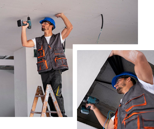 A man is fixing a sink in a kitchen.