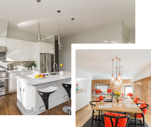 A man is fixing a sink in a kitchen.