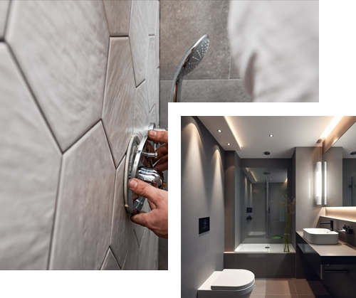 A white house with a mirror on the wall and a table in front of it.