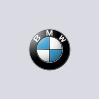 BMW logo: circular emblem with blue, white, and black quadrants, the letters "B", "M", and "W" around the perimeter.