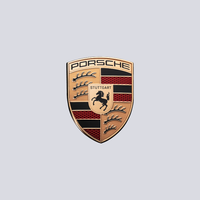 Porsche emblem on a light gray background. Gold, black, and red crest with a black horse.