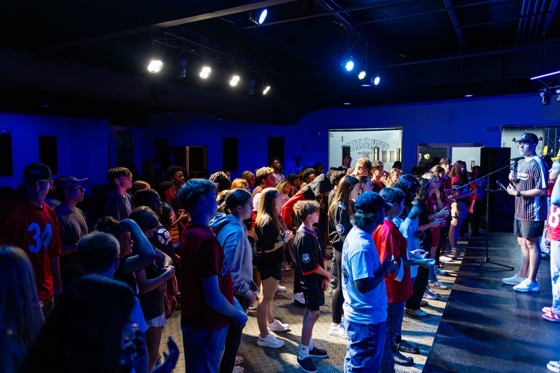 A white t-shirt with the words yth midweek written on it