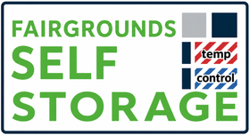 Fairgrounds Self Storage sign with green text and a red-blue “temp control” logo
