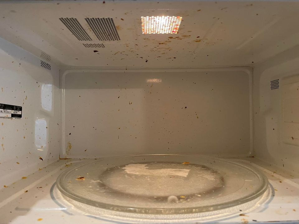 Before Cleaning The Microwave Oven — Owensboro, KY — Nella's Cleaning Company