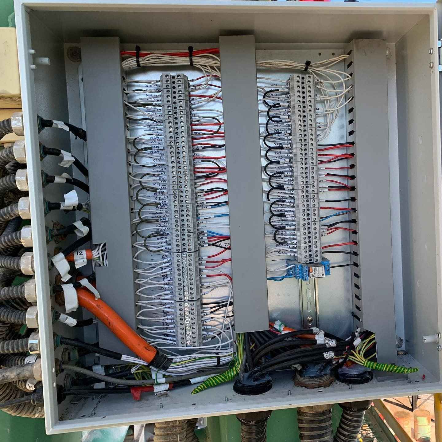 Open Electrical Control Panel With Wires, Connectors, and Terminal Blocks — Russell Taber Electrical & Solar in Lake Albert, NSW