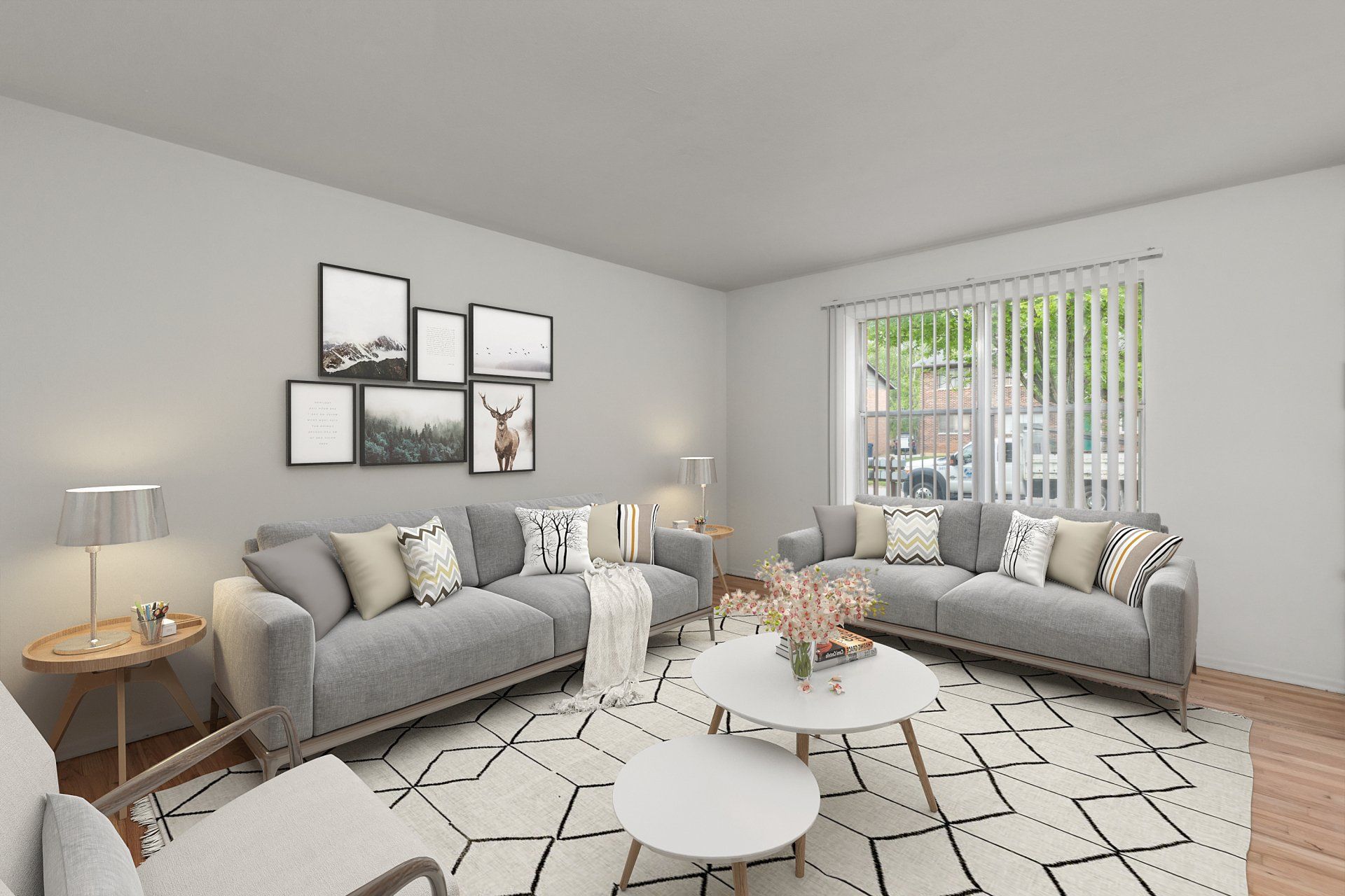 Leslie Apartments living room with couch, rug, and coffee table - furniture for example purposes only.