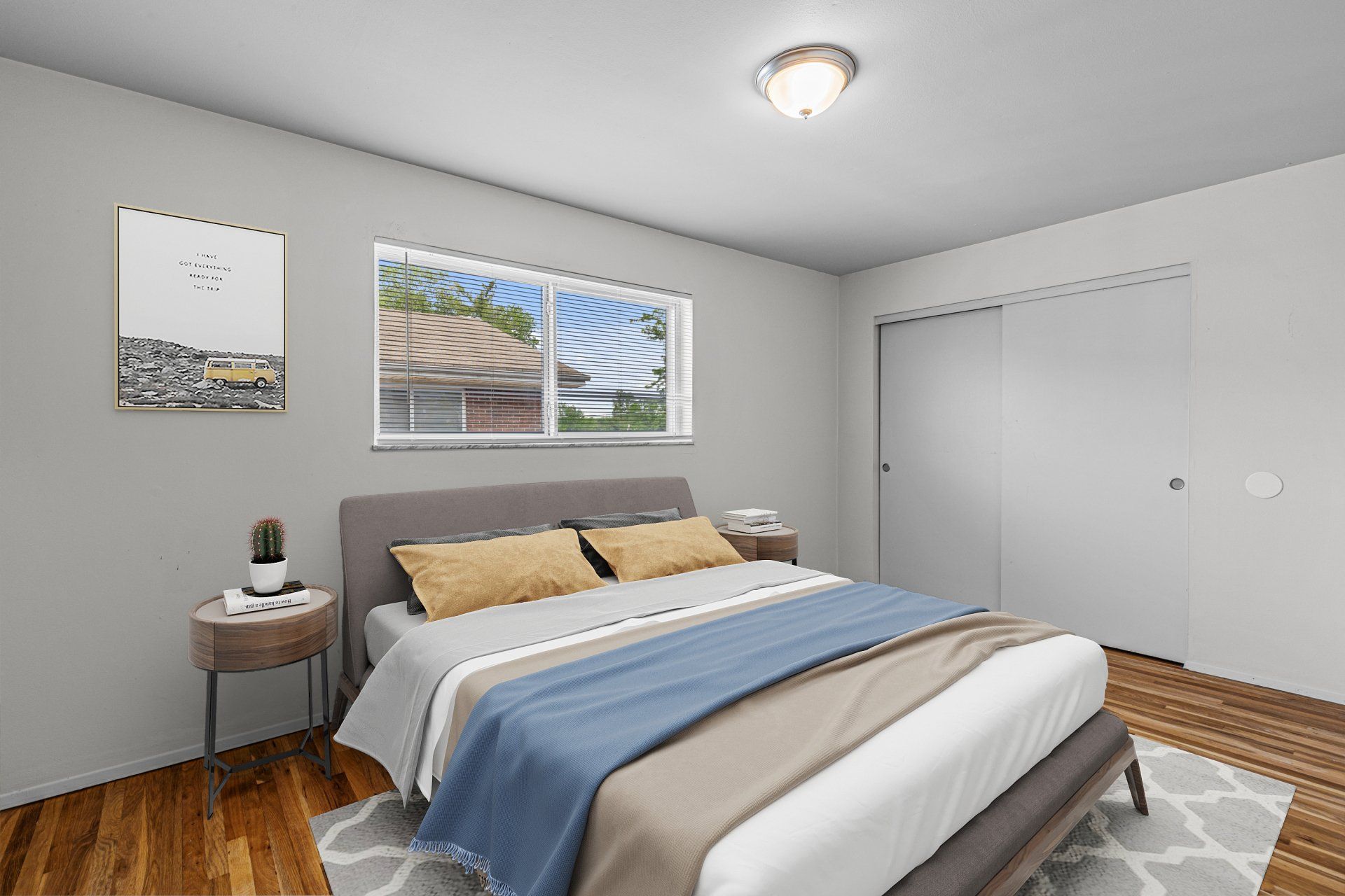 Charbonier Apartments interior bedroom with closet, and bed and nightstand for example purposes.