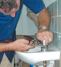 Plumbing Services - Skegness - Richard Hardie - Plumber and basin