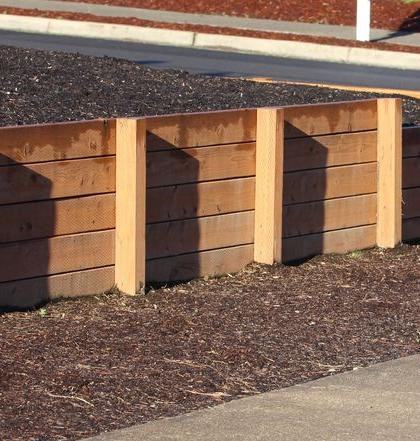 Wooden Retaining Wall — PROFENCE AND RETAINING in Beecher, QLD