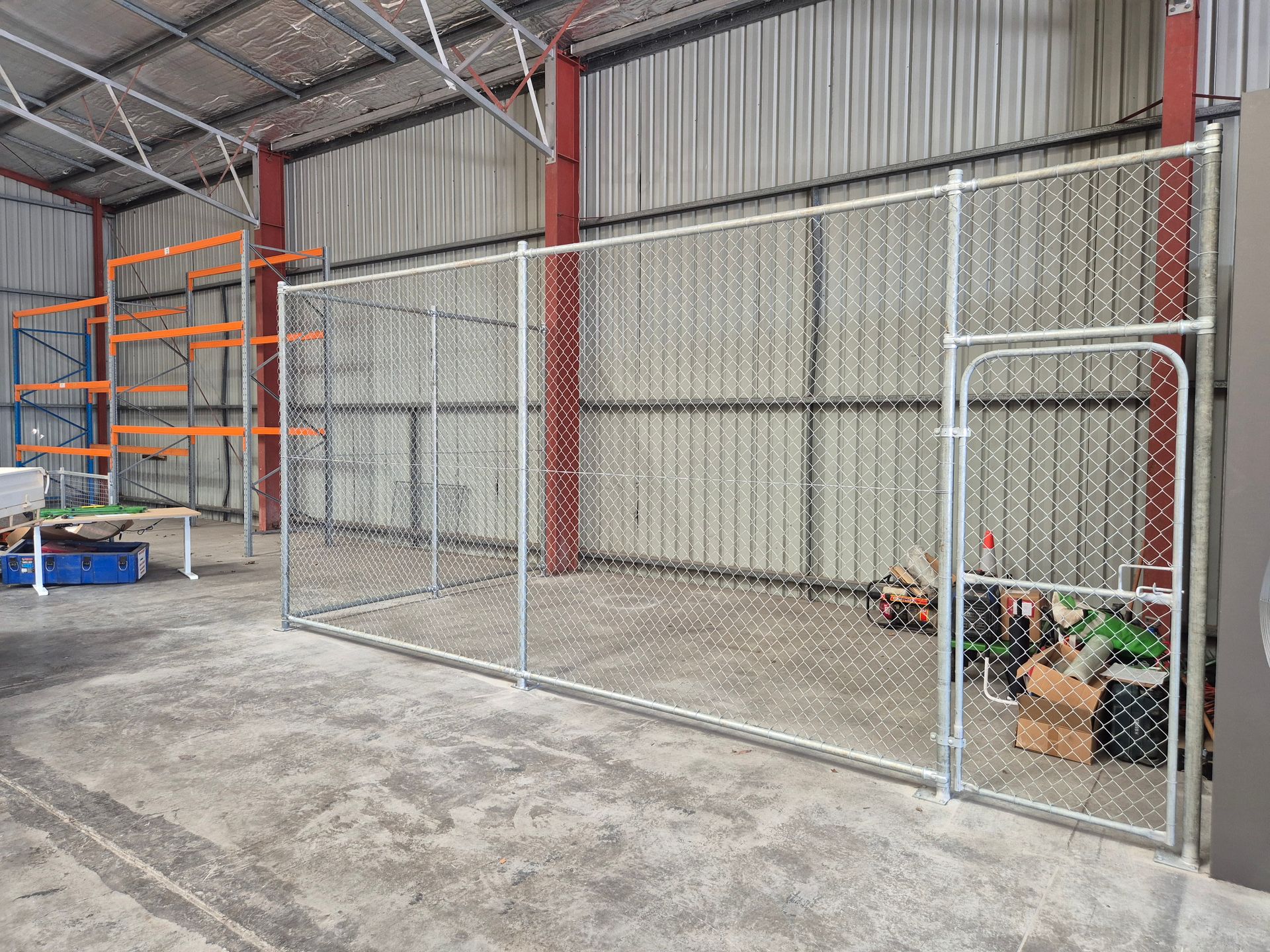 A Tall Chain-link Security Fence With an Integrated Door — PROFENCE AND RETAINING in Beecher, QLD
