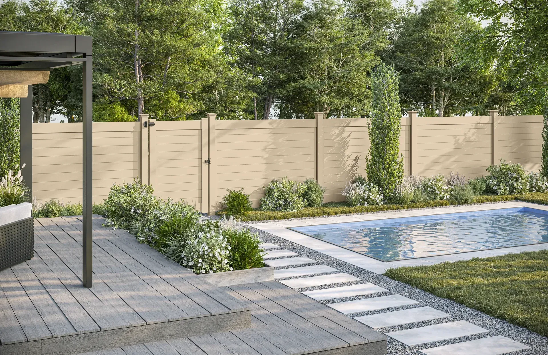 Backyard with a light beige fence, swimming pool, and stone pathway. Lush green foliage surrounds the area.