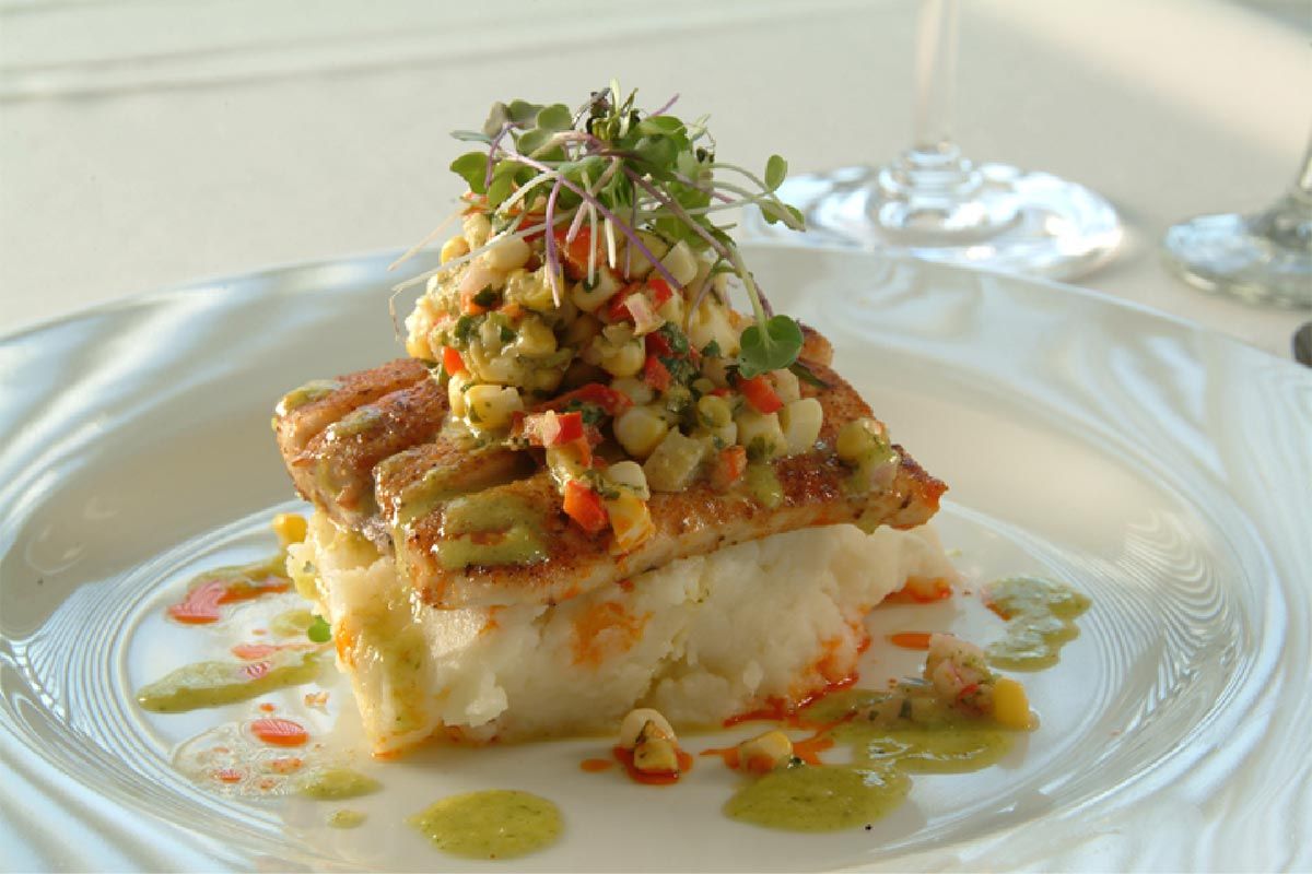 A close up of a plate of food on a table