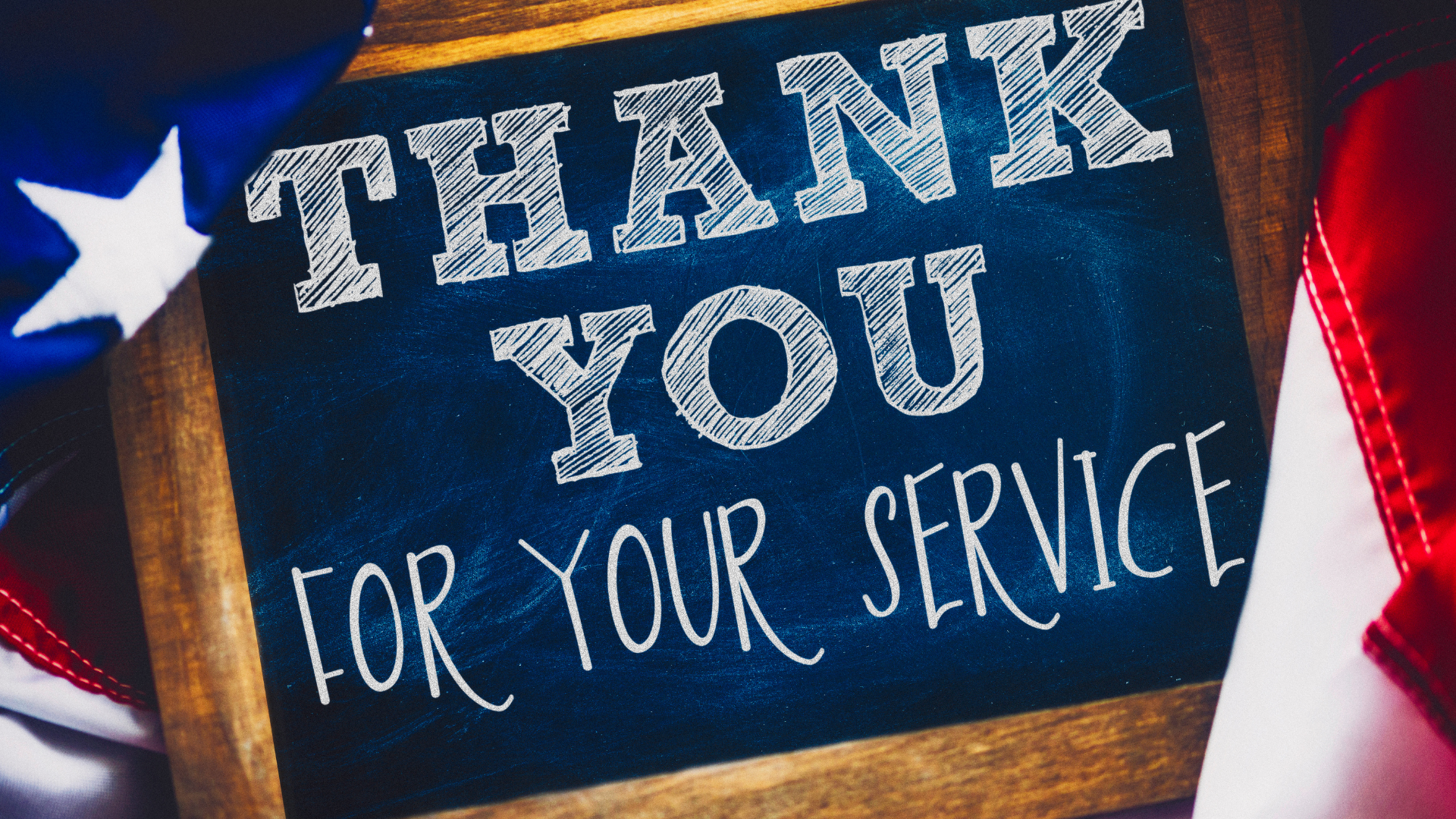 A chalkboard with the words `` thank you for your service '' written on it.