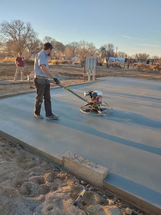 Close-up of weathered brick pavers in a sunny outdoor setting; focus on textures and color variations.