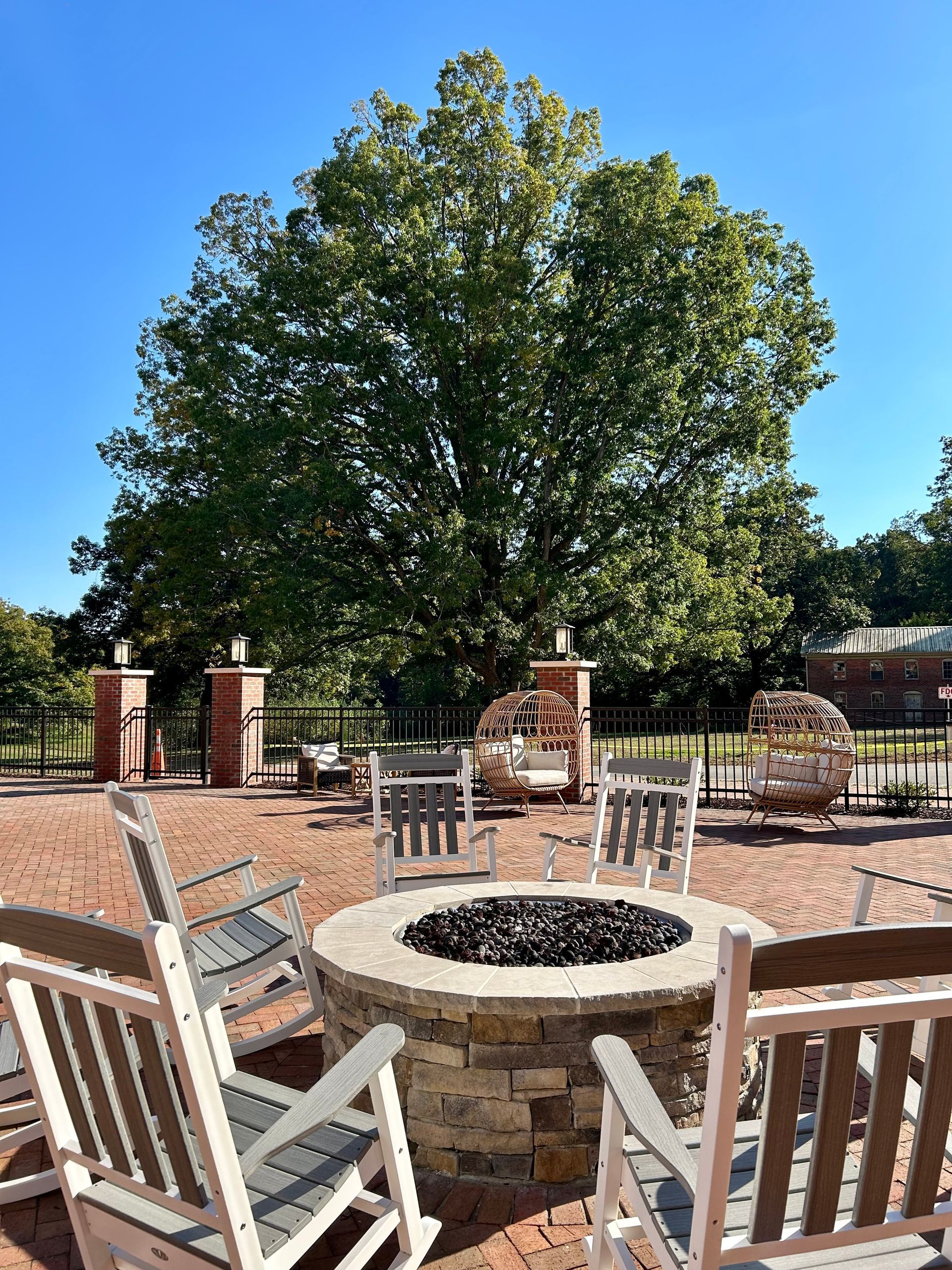 A large brick building is lit up at night