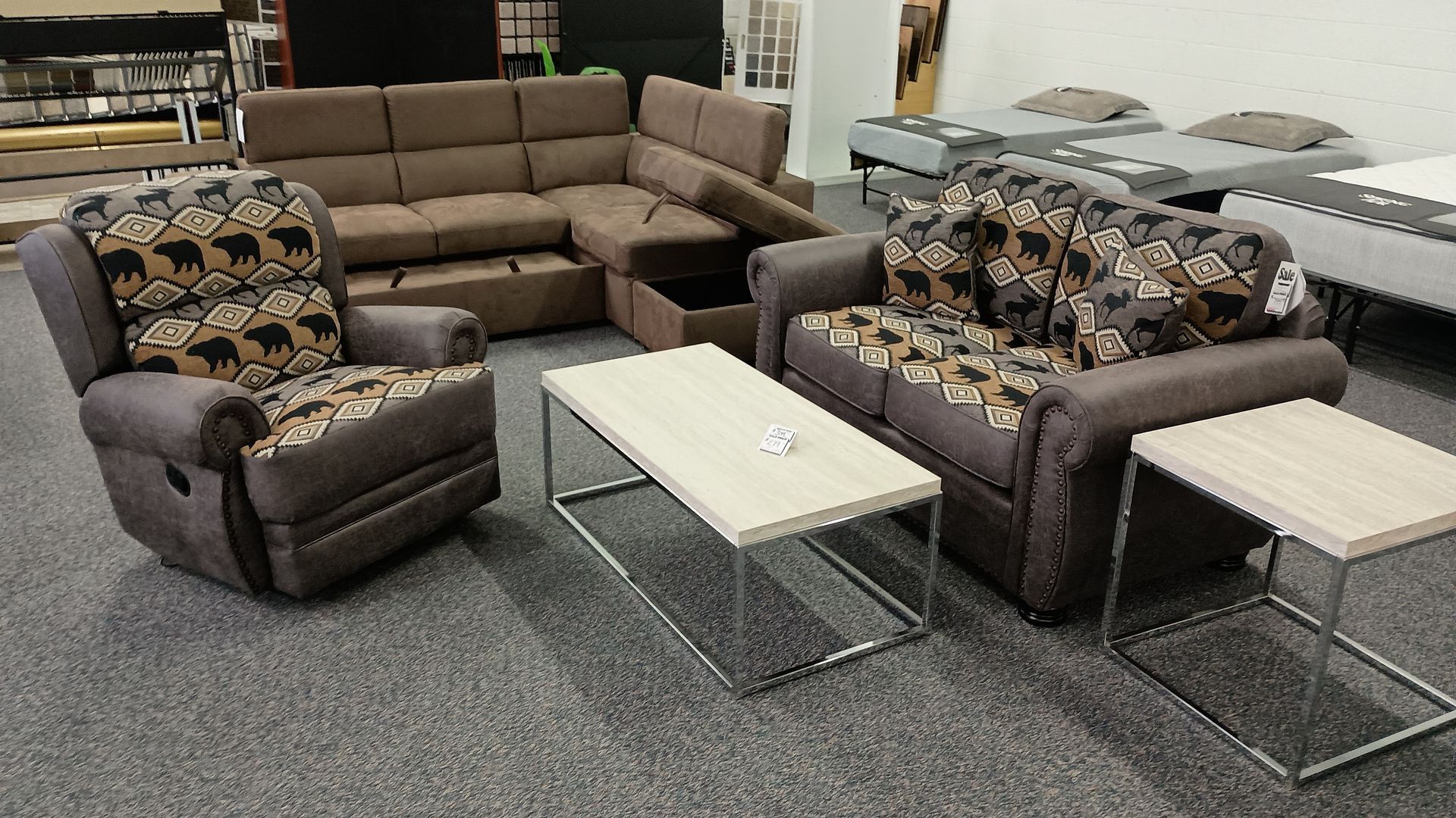 A living room with a couch a chair and a coffee table